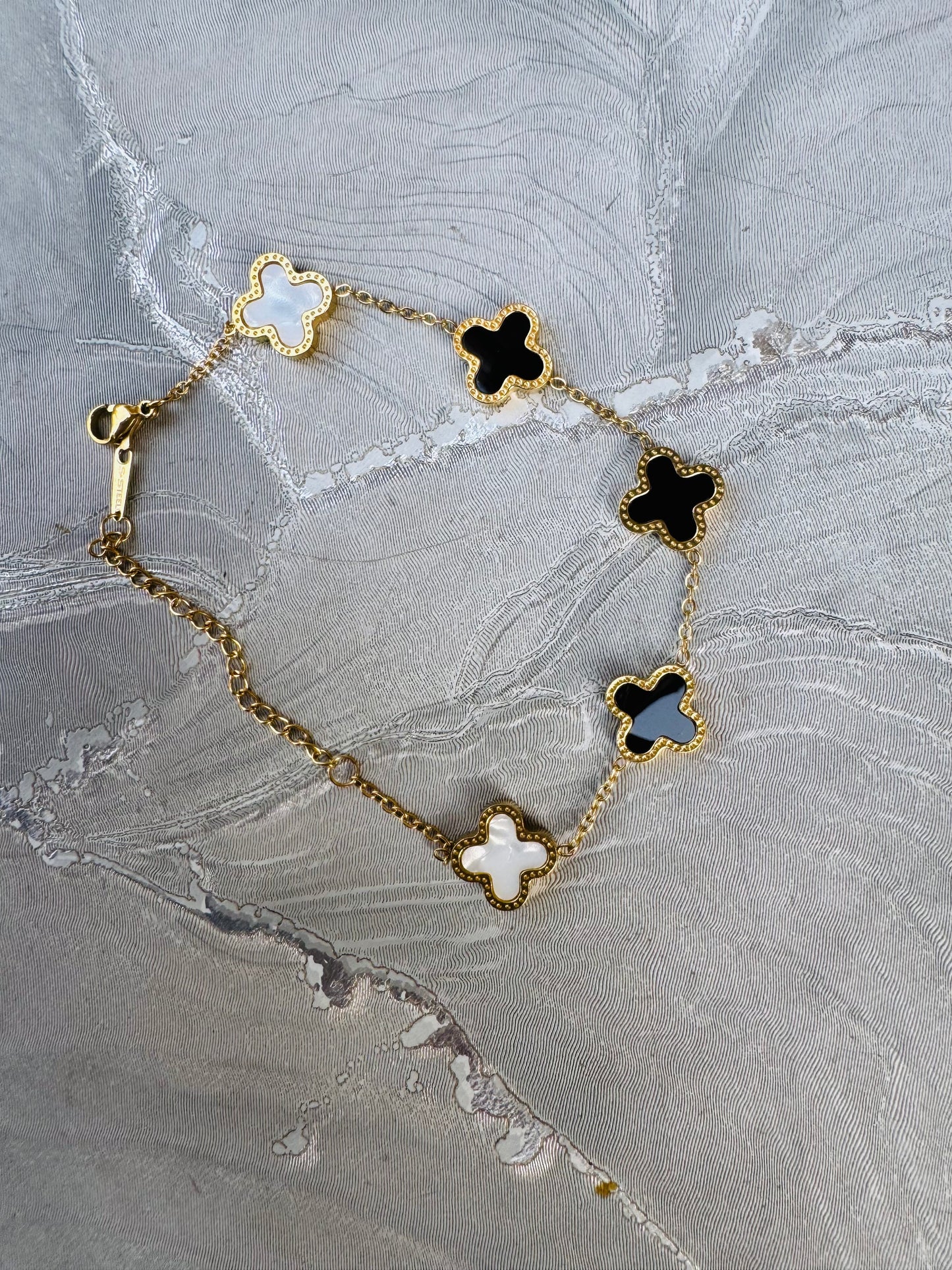 Elegant Black & White Double Sided Clover Bracelet –
